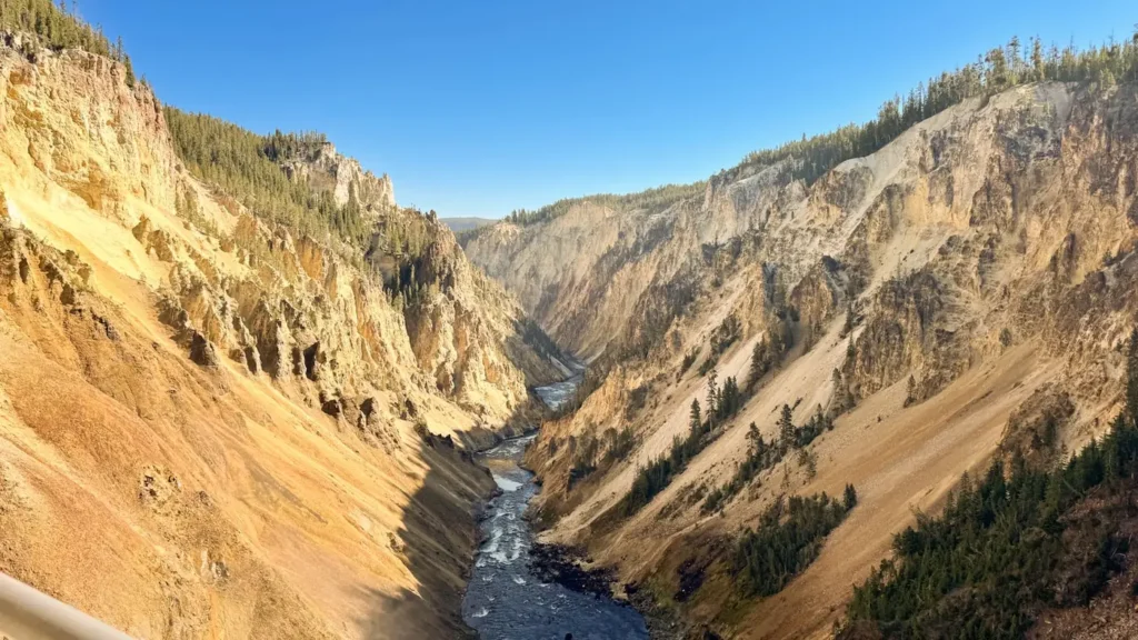 A river running through a deep rock canyon in the mountain West